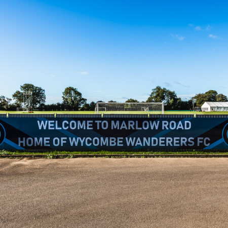 Banner outside, at entry to grounds.