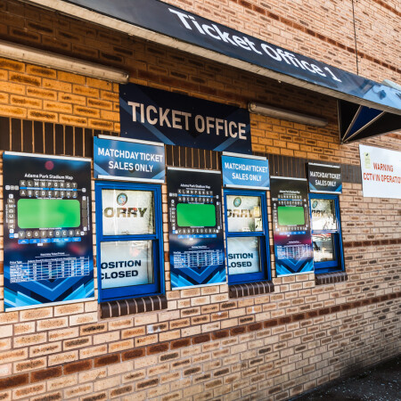 Graphics on wall by ticket office.