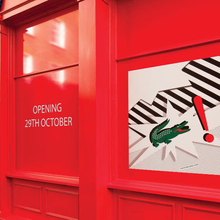 Lacoste Window Display, red hoarding with crocodile logo