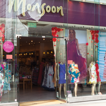 Monsoon hanging fabric graphics in window