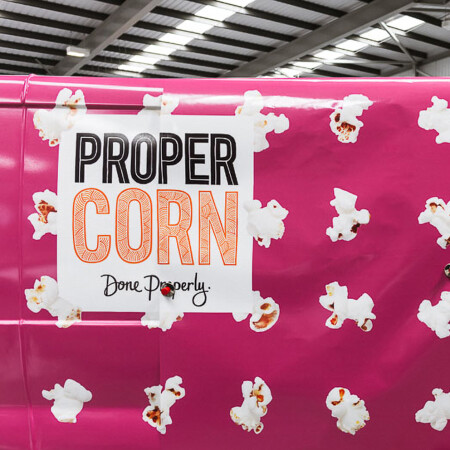 Propercorn Van Fleet Wraps installing onto van