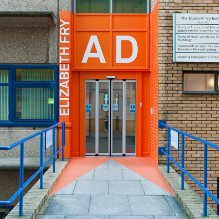 University of Surrey Wayfinding AD on and around door