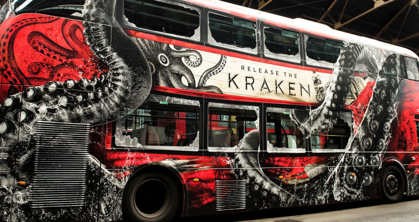 The Kraken wrap on a red bus