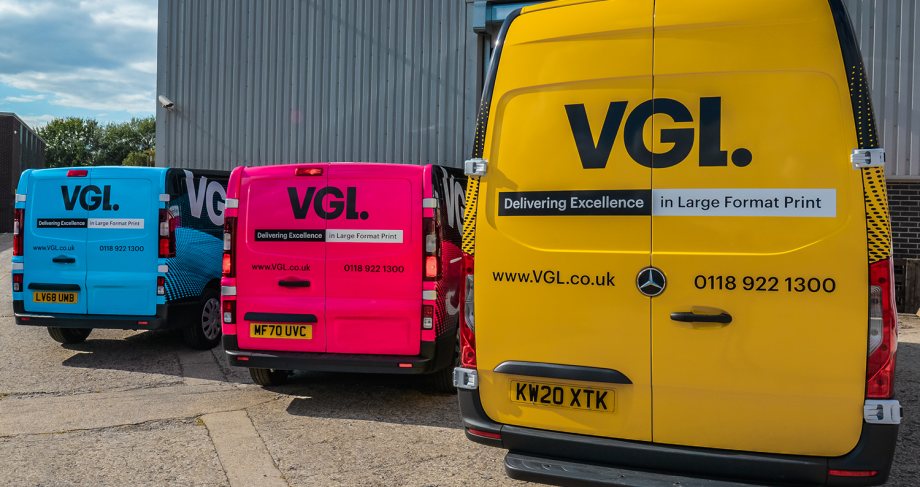 Brightly coloured VGL branded vans 
