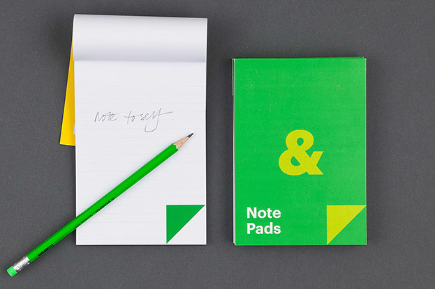 Notepads with pencil green and yellow