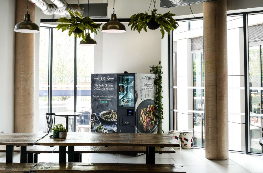 Cook vending machine in restaurant.